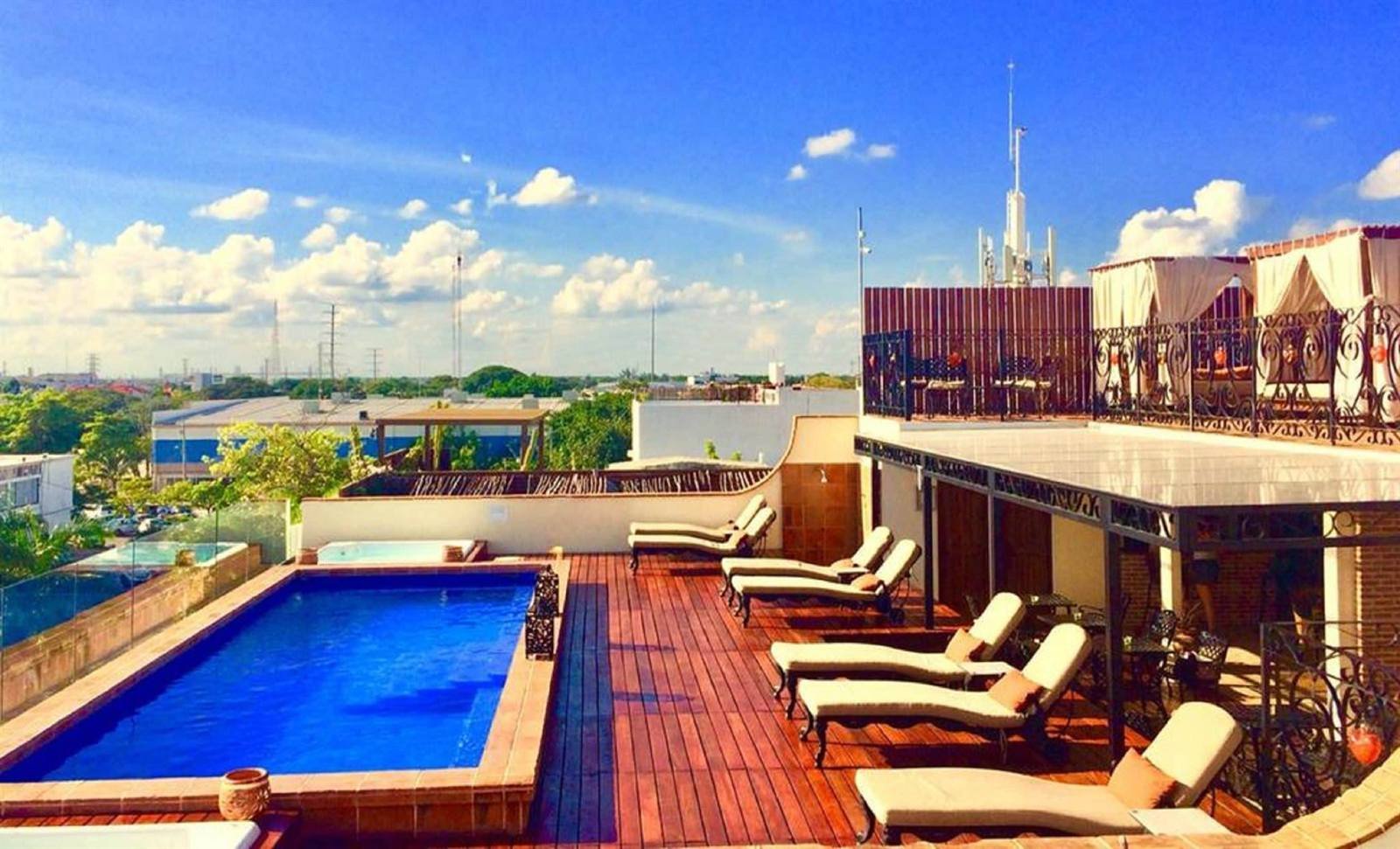 La Pasión Hotel Boutique: rooftop pool with a view over downtown Playa del Carmen